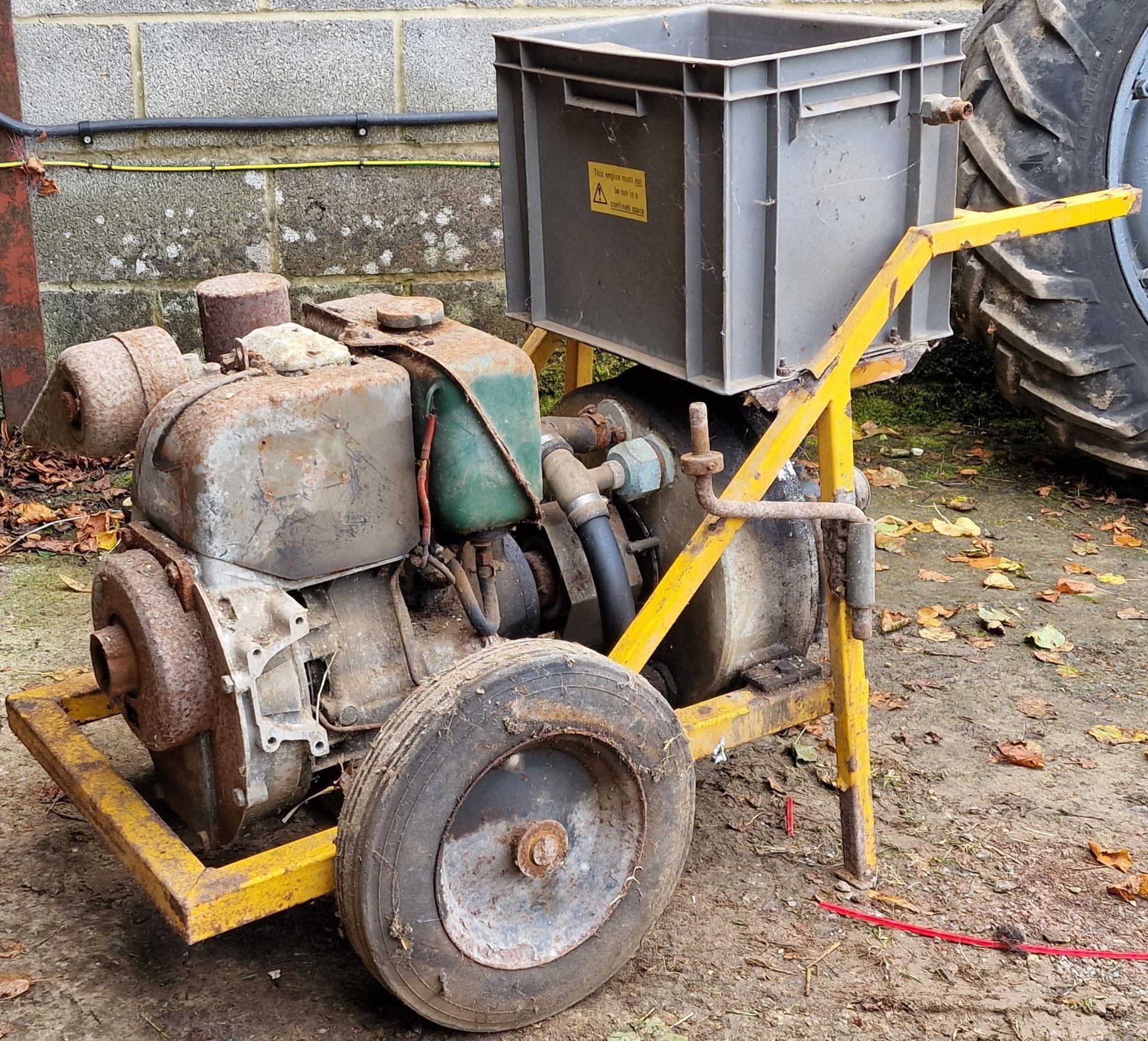 Vintage water pump engine on stand