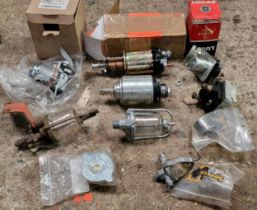 Collection of vintage tractor parts to include petrol tank filter, coils, fuel lift pump, 12v