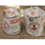 Two cans of 'The Complete Automobilist' tank sealant (2)