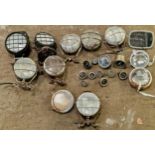Collection of vintage tractor lights and gauges