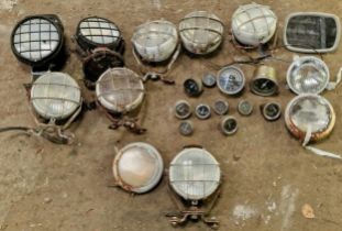 Collection of vintage tractor lights and gauges