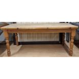 Large pine farmhouse kitchen table on turned baluster legs, 77cm high