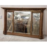 Arts and Crafts fumed oak triptych wall mirror with original bevelled plate and turned pilasters,