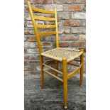 Vintage Italian beech dining chair in the manner of Gio Ponti, with ladder back and strung seat