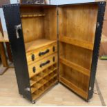 Contemporary steamer trunk wardrobe with fitted interior, faux crocodile leather finish and