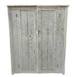 19th century rustic painted pine house keepers cupboard, twin doors enclosing a shelved interior,