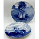 Pair of Doulton burslem blue and white Dutch style chargers, 35m diameter (2)