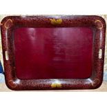 Regency toleware twin handled tray with gilt decoration on a red ground, 55 x 75cm