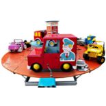A merry-go-round-style carousel toy vehicle ride funfair attraction featuring cars, a train,