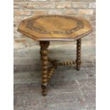 19th century oak gypsy type table, the octagonal top carved with scrolled acanthus upon three bobbin