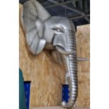 Stylised silvered elephant head wall trophy, 64cm high