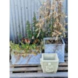 Collection of four reconstituted garden planters of varying sizes to include a pair of rectangular