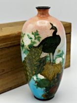 Early 20th century cloisonne on silver vase, decorated with a peacock, 15cm high, with original