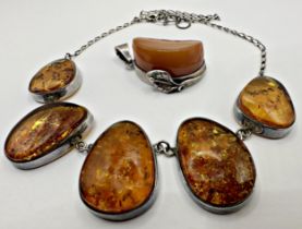 Silver butterscotch amber pendant, 3 x 2.cm (not including bale), 16.1g, with a further silver and