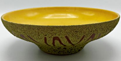 West German studio pottery bowl with yellow glazed interior and green textured exterior with