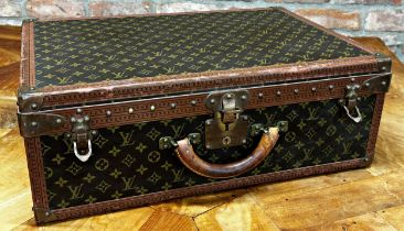 A stunning Louis Vuitton 'Alzer 60' vintage hard suitcase formerly belonging to the Earl of