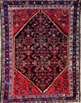 Good Persian rug, with intricate decoration on red ground, L197 x W126cm