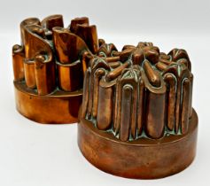 Pair of antique copper jelly moulds in the manner Benham and Froud, 12cm high (2)