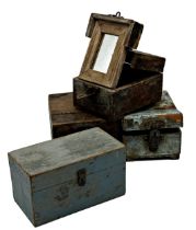 Three vintage Indian primitive travel boxes, the hinged lids enclosing a further hinged foldable