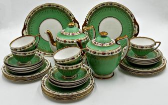 Royal Doulton tea service, Rd No 773350, with floral and gilt bands on a green ground, comprising