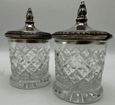 Pair of silver topped cut glass preserve pots, 13cm high (2)