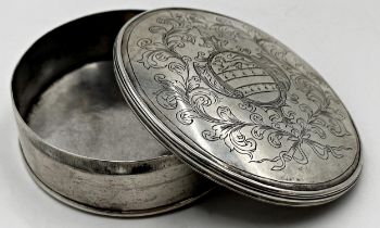 17th century silver oval lidded box, engraved with a lion shield framed by acanthus, maker PH,