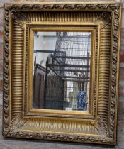 Florentine style giltwood and gesso wall mirror with bevelled edge glass plate, 69cm high x 57cm