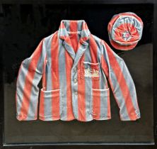 Vintage framed diorama of a candy striped school cap and blazer, the blazer top pocket stitched with