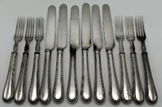 Set of beaded white metal (untested) handled flatware for six, comprising knives and fork, steel