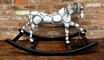 Early 20th century papier mache dapple grey rocking horse, with horsehair and ebonised base, 106cm