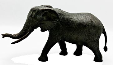 Good quality bronze sculpture of a standing elephant, indistinctly signed, 15 x 29cm