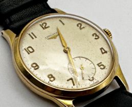 Vintage 9ct Longines gents dress watch, 35mm case, champagne dial with gilt Arabic numerals and
