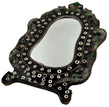 Unusual Eastern shaped wall mirror, applied with various horn and enamels upon a textured white