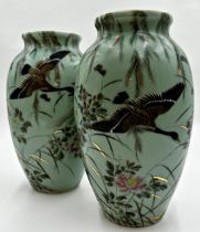 Pair of Chinese porcelain Republic period celadon baluster vases painted with geese amidst flowers