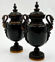 Exceptional quality pair of 19th century French bronze twin handled lidded urns, 23cm high (2)