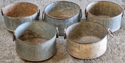 A collection of five galvanised jardinières, 16cm high x 32cm diameter (5)