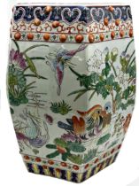 Chinese porcelain hexagonal garden seat, enamelled with fish, ducks and lotus flowers, 46cm high x