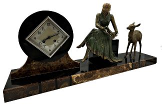 Art Deco French black slate figural mantel clock mounted by a seated female and deer, with two train