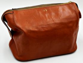 Swaine Adeney Brigg tan leather wash bag featuring gilt metal hardware, hand loop for carrying or
