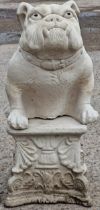 Reconstituted stone statue of a bulldog raised on a square pedestal base, 68cm high