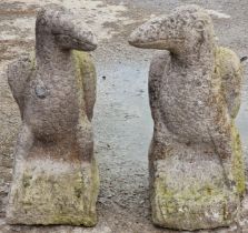 Pair of weathered garden ornaments in the form of ravens, 61cm high