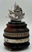 Interesting nautical Charles Frodsham commemorative world time clock, mounted with silver galleon,