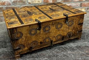 Indian hardwood and iron box with rising lid and carved medallions, 35 x 80cm