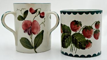 Wemyss pottery 'Sweet Pea' tyg, 14.5cm high with a further Wemyss 'Wild Strawberry' pattern brush