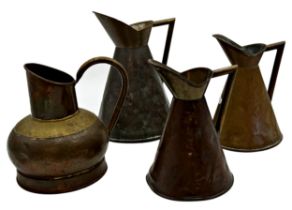 Three Henry Fearncombe copper or brass jugs, with a further Christopher Dresser style copper jug (4)