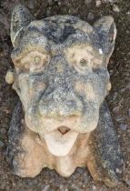 Weathered stone hanging wall mask in the form of a big cat, 38cm high