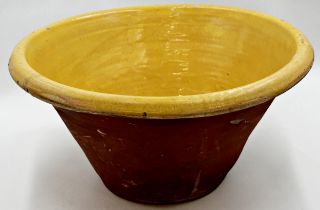 Good terracotta dairy bowl with yellow glazed interior, 45cm diameter x 23cm high