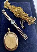 Antique seed pearl mourning pendant, 9ct aquamarine bar brooch and further yellow metal brooch