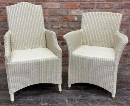 Two Vincent Sheppard Lloyd loom style conservatory chairs with cream painted finish and brass foot