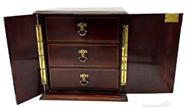 Inlaid mahogany two door, three drawer table cabinet. H 33cm, W 31cm, D 23cm